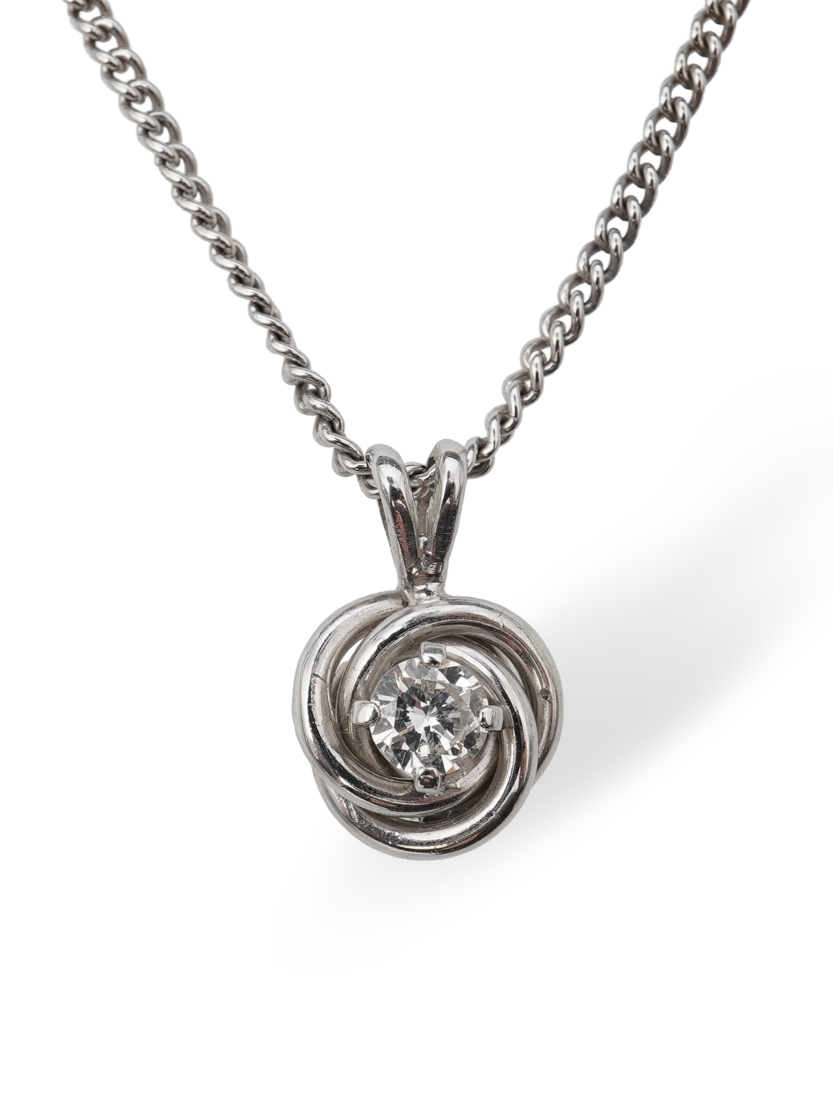 A diamond pendant necklace
